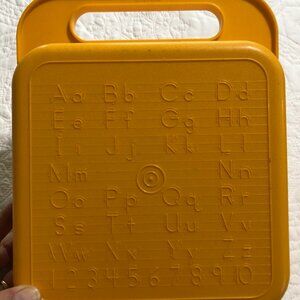 Vintage Tupperware stencils and carrying case